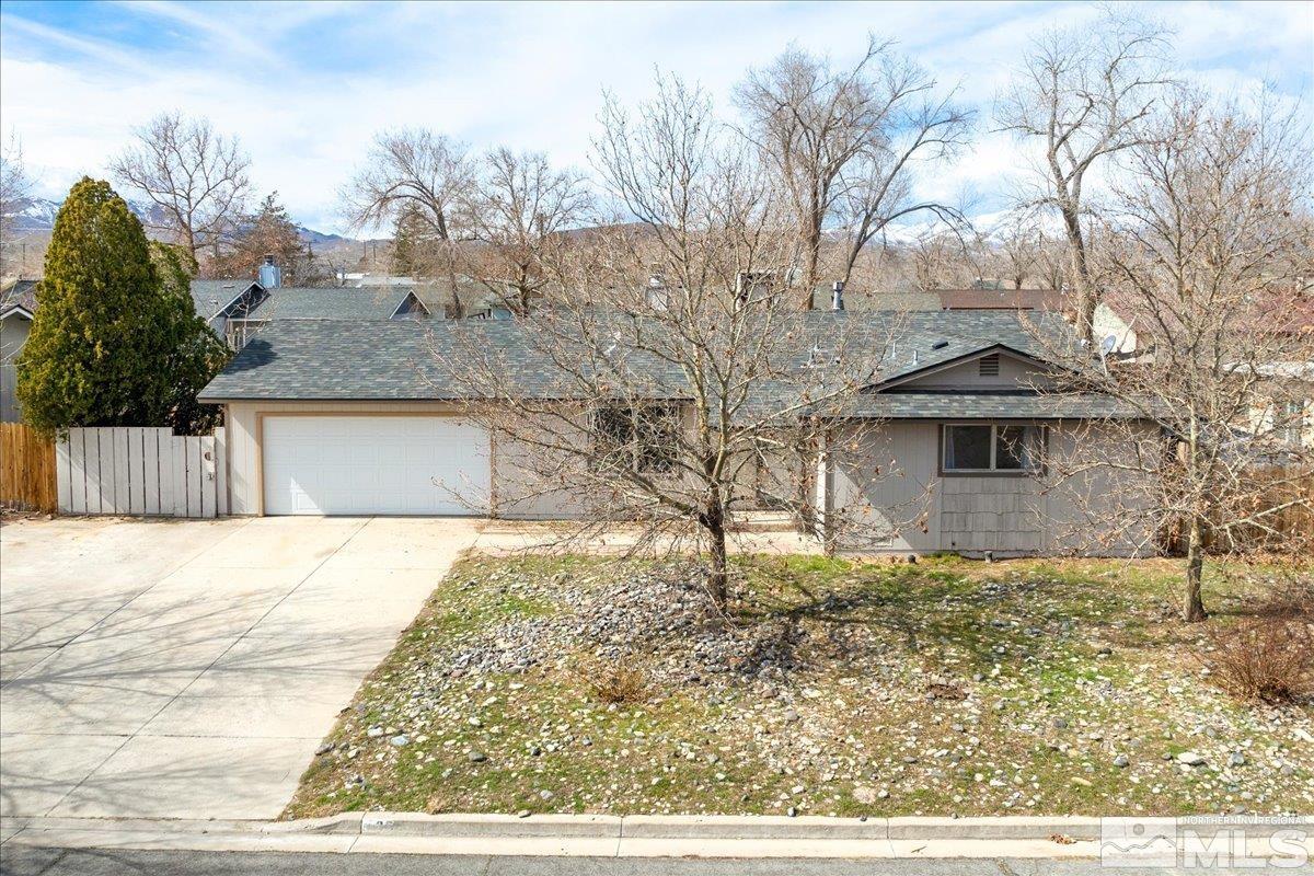 350 Sycamore Street Fernley, NV 89408 - Photo 24 of 24 a front view of a house with a yard