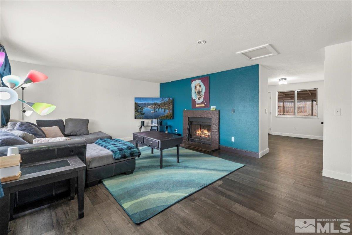 350 Sycamore Street Fernley, NV 89408 - Photo 3 of 24 a living room with furniture and a wooden floor