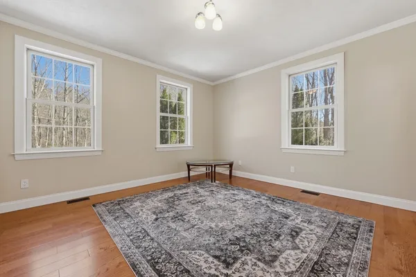a view of a room that has a window in it