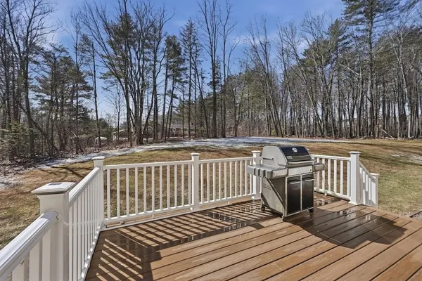 a view of balcony with wooden floor and outdoor space