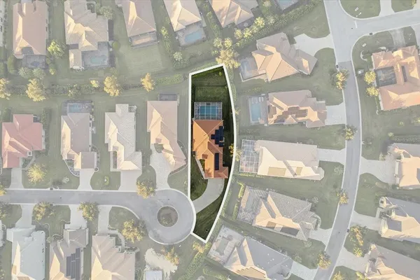 a view of a dining room with furniture wooden floor and a chandelier