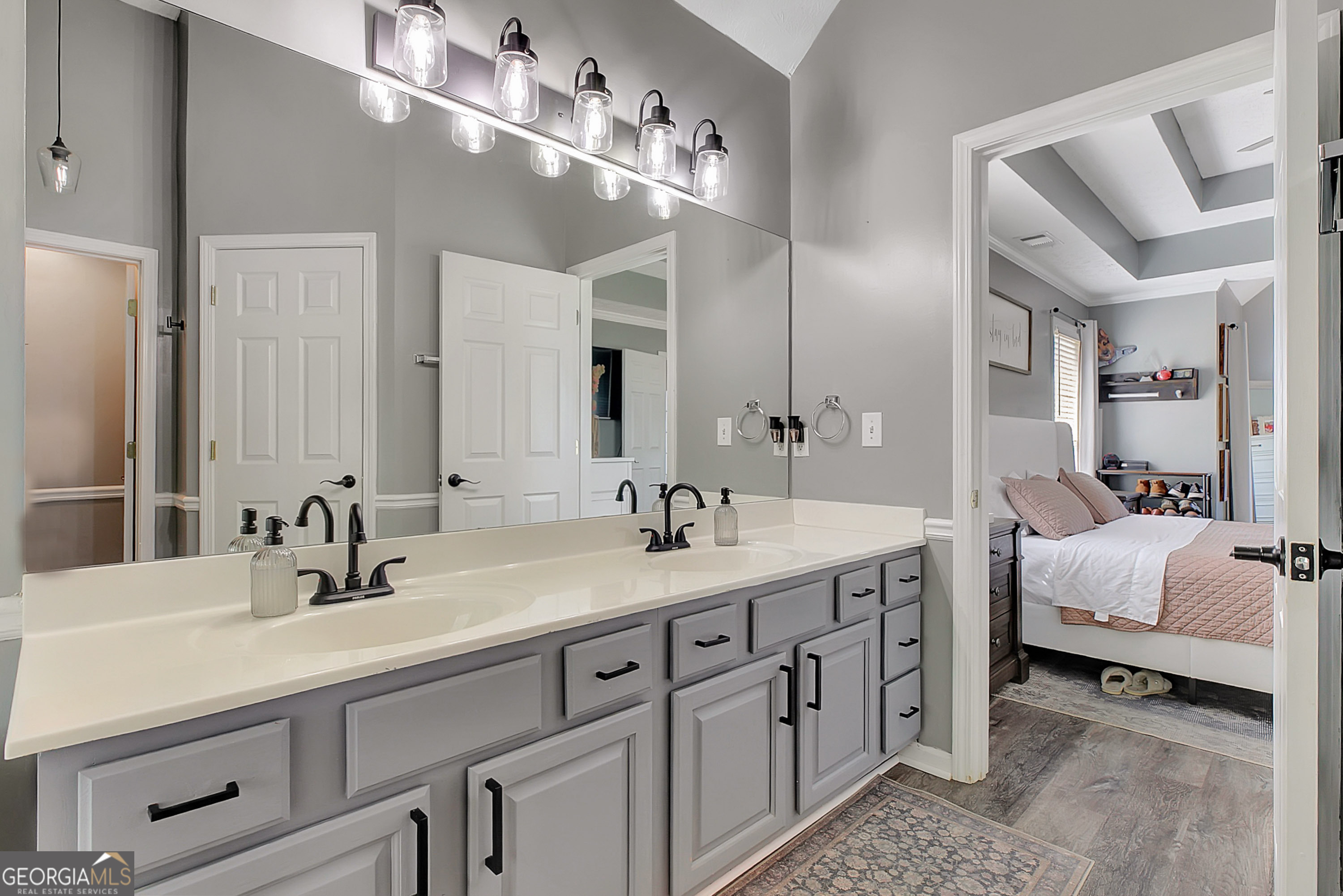229 John Lovelace Road LaGrange, GA 30241 - Photo 17 of 59 a bathroom with a double vanity sink and a mirror