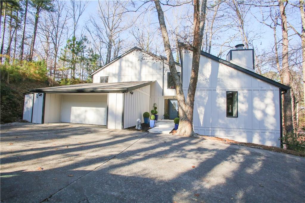 4830 Rebel Trail Sandy Springs, GA 30327 - Photo 2 of 75 a view of a house with a outdoor space