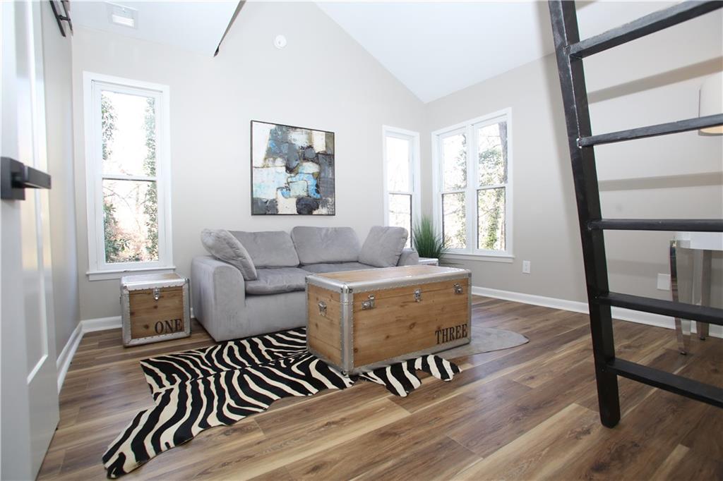 4830 Rebel Trail Sandy Springs, GA 30327 - Photo 59 of 75 a living room with furniture and a window