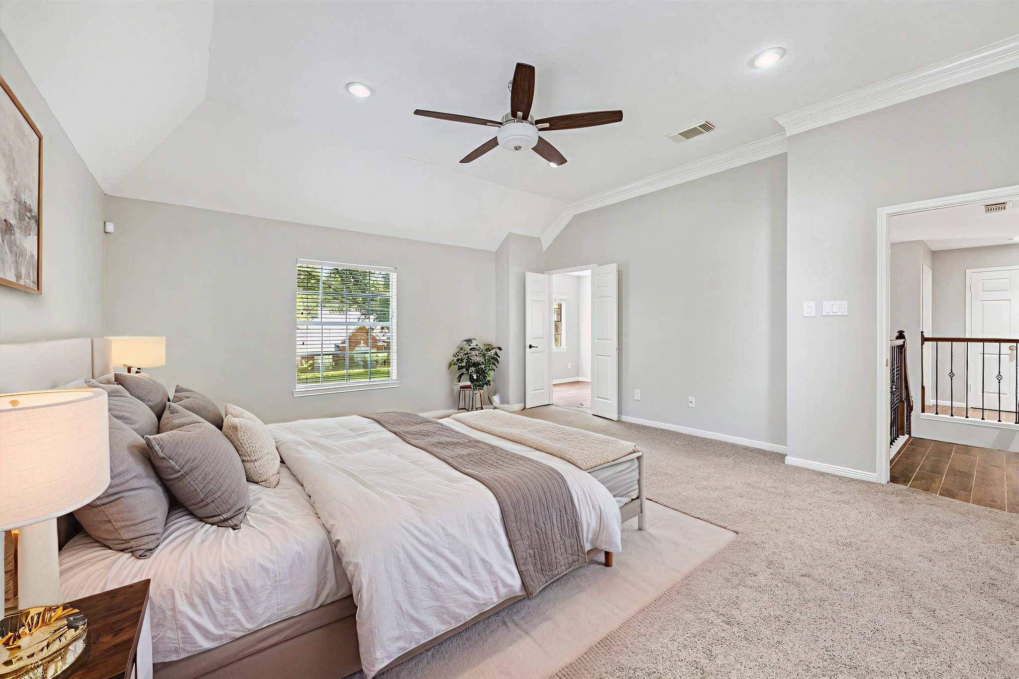 2006 Raven's Crest Drive Sugar Land, TX 77478 - Photo 14 of 29 a bedroom with a bed and a window
