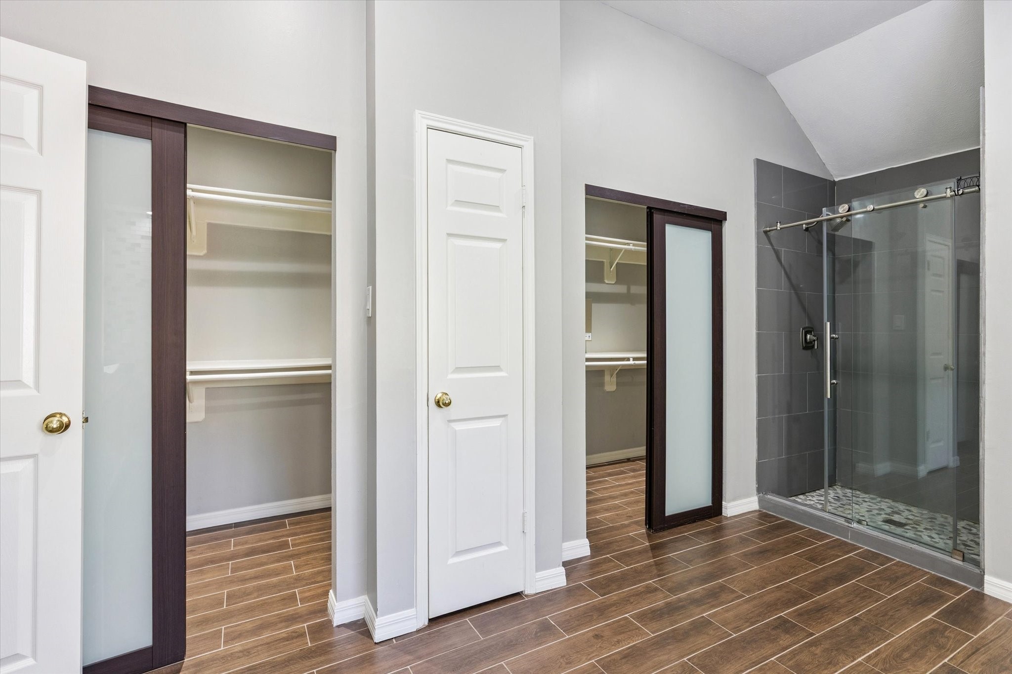 2006 Raven's Crest Drive Sugar Land, TX 77478 - Photo 17 of 29 a view of an empty room with wooden floor