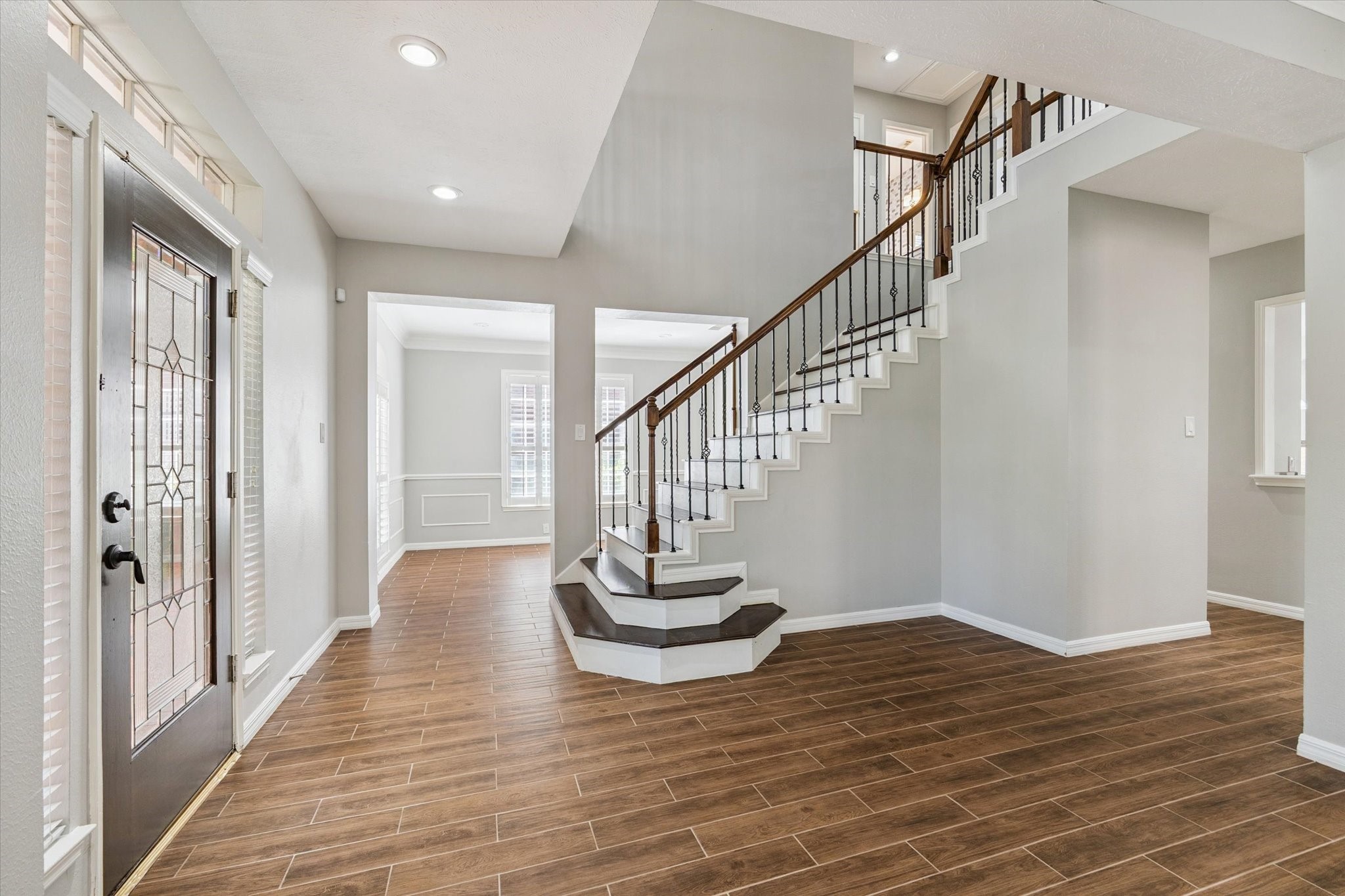 2006 Raven's Crest Drive Sugar Land, TX 77478 - Photo 3 of 29 a view of entryway and hall with wooden floor
