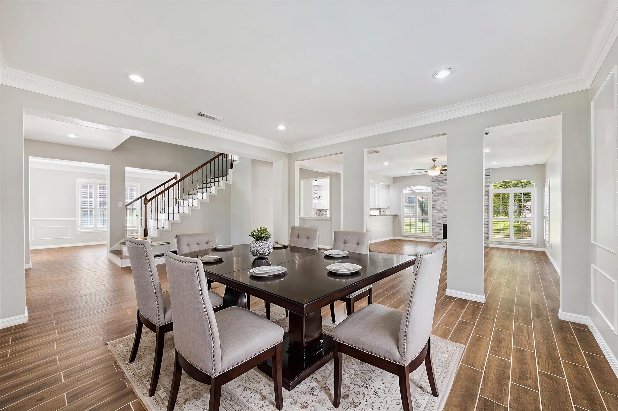 2006 Raven's Crest Drive Sugar Land, TX 77478 - Photo 4 of 29 a view of a dining room with furniture and wooden floor