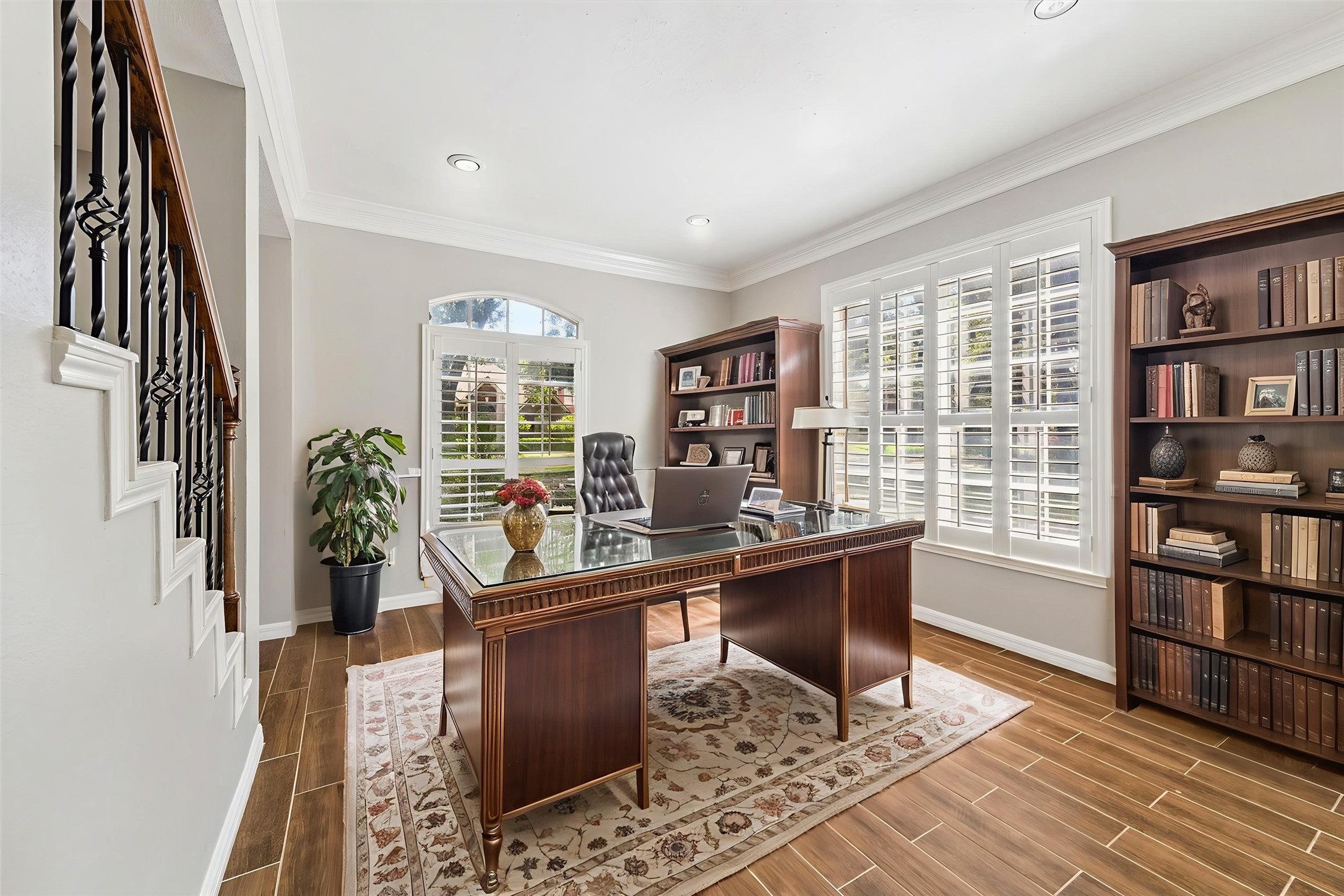 2006 Raven's Crest Drive Sugar Land, TX 77478 - Photo 5 of 29 a view of a workspace with furniture and a window