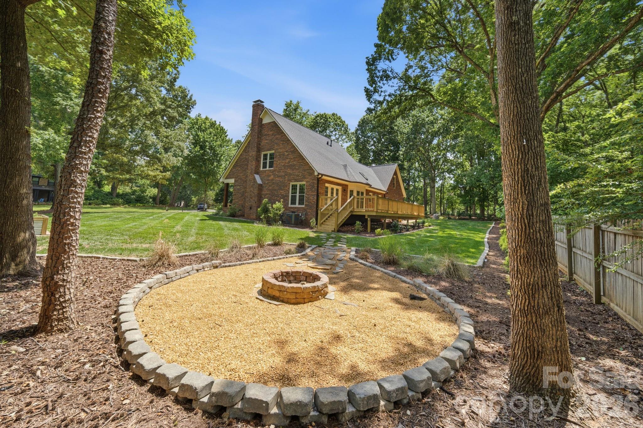 5243 Mintridge Road Mint Hill, NC 28227 - Photo 38 of 43 a view of a house with backyard and sitting area