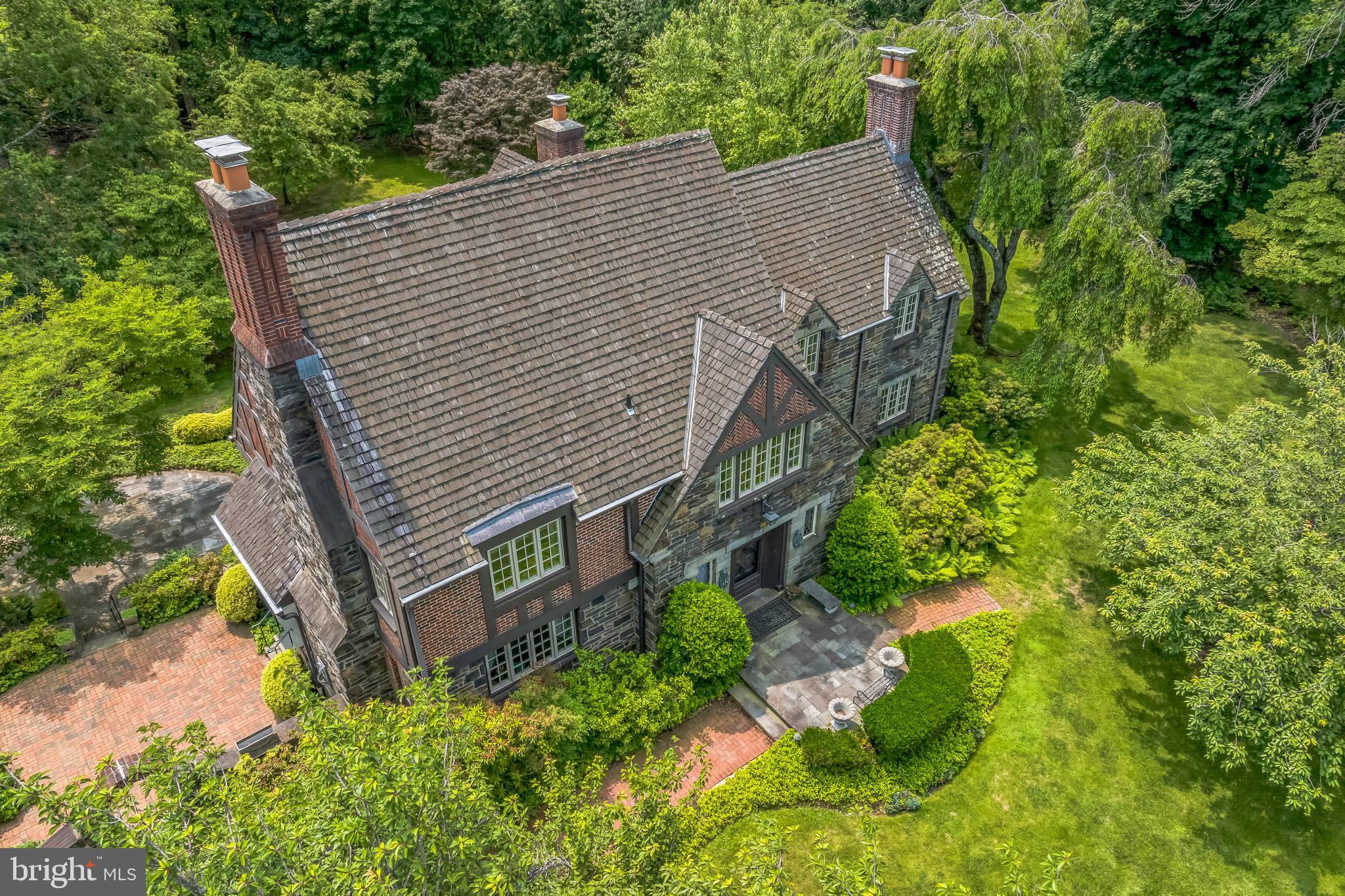 328 Sugartown Road Devon, PA 19333 - Photo 21 of 34 front view of a house with a yard