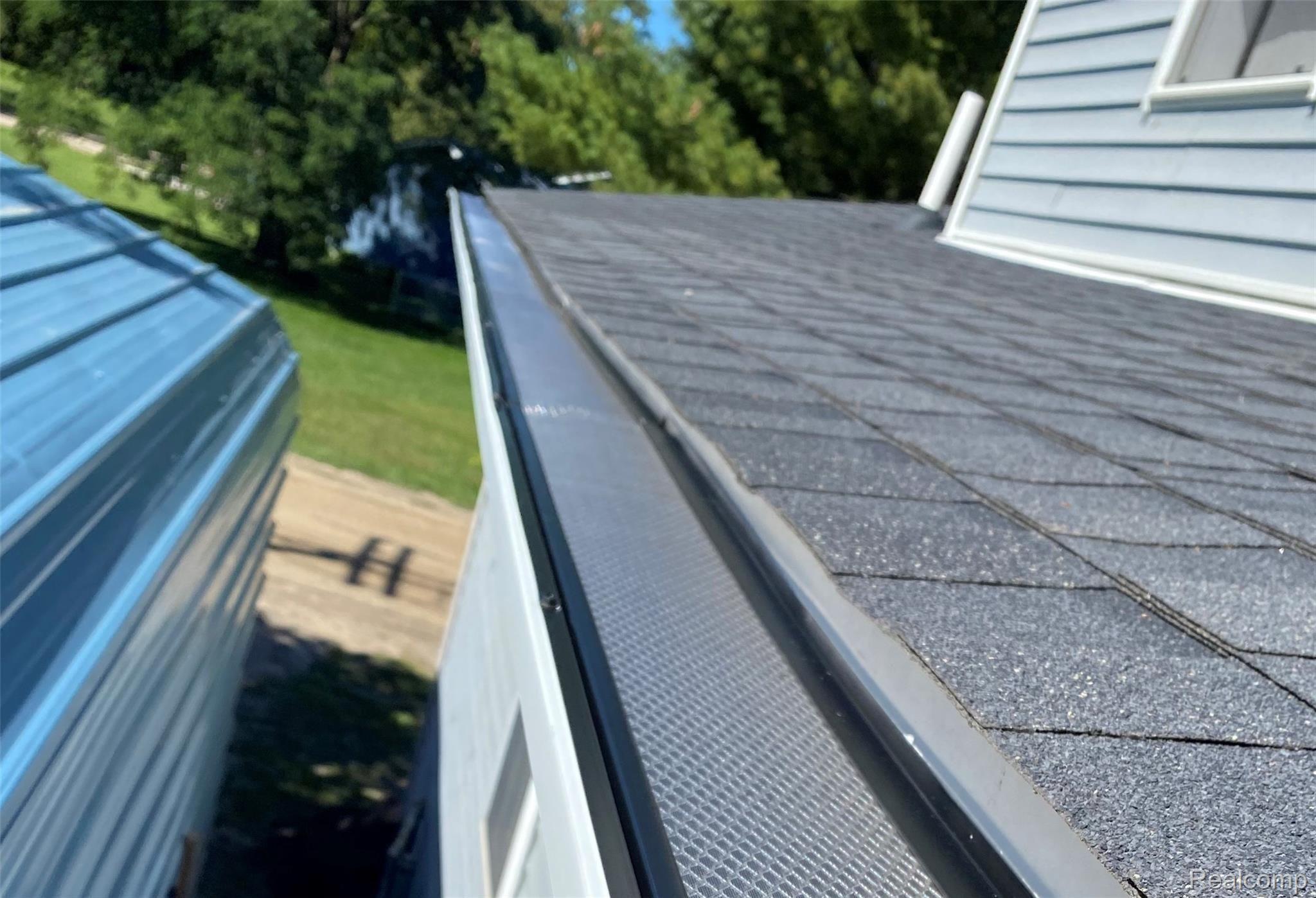 7302 Laurel Road Lexington, MI 48450 - Photo 8 of 12 gutters.jpeg