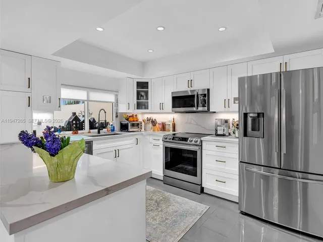 a bathroom with a toilet a sink and a window
