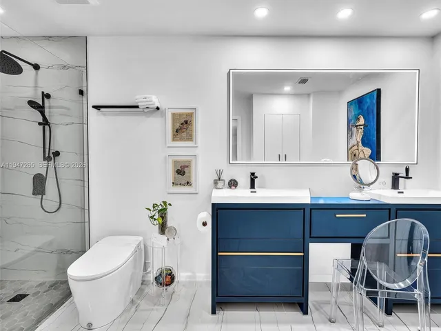 a work room with furniture and entryway