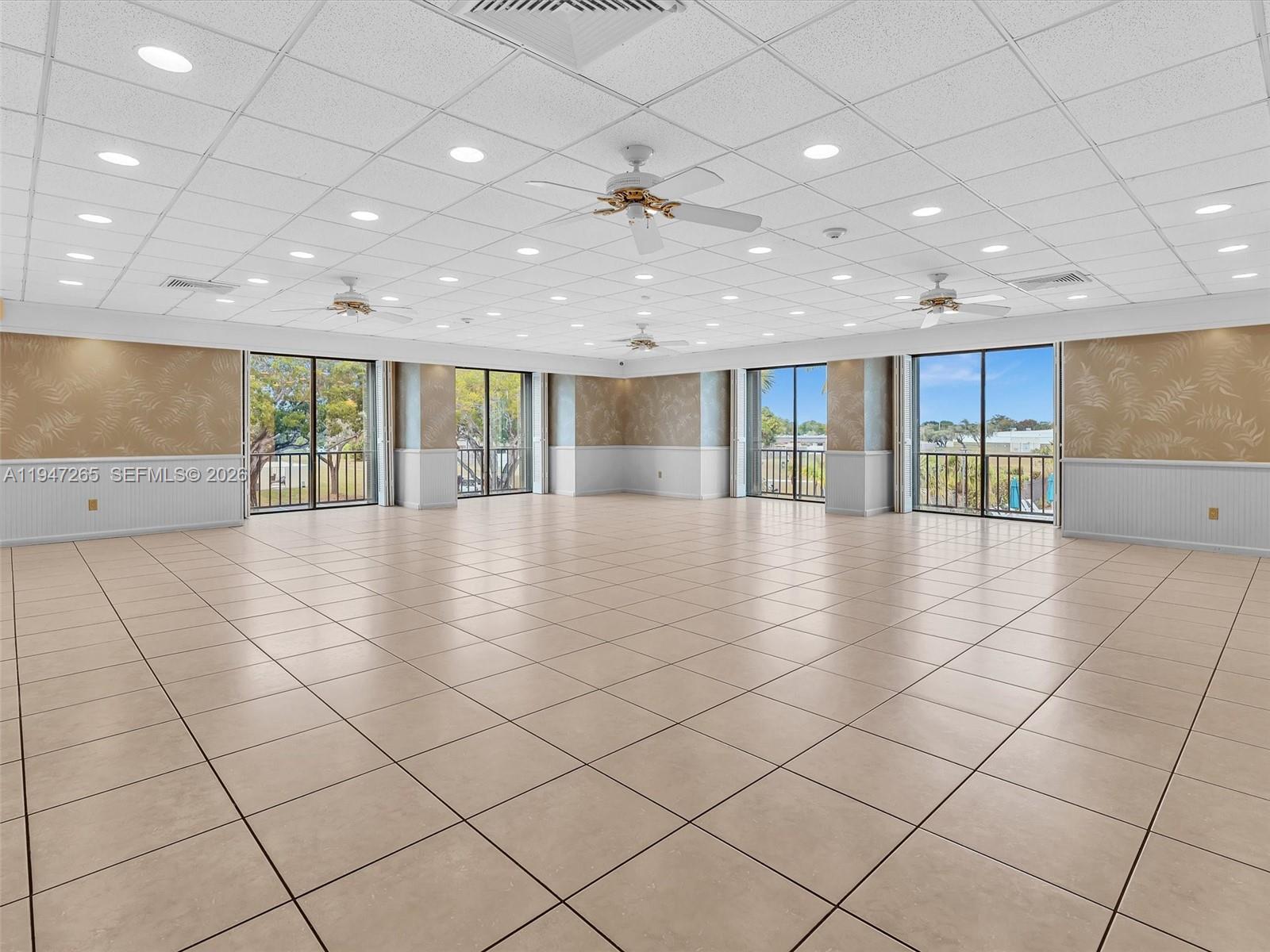 7661 Southwest 102nd Place Miami, FL 33173 - Photo 34 of 51 a view of an empty room with wooden floor