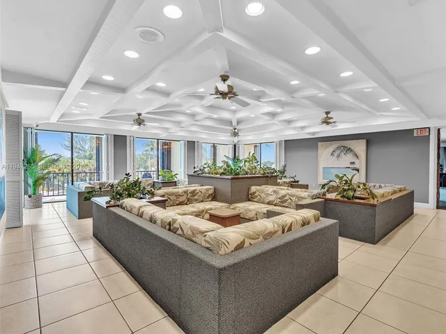 a view of a dinning table and chairs in patio