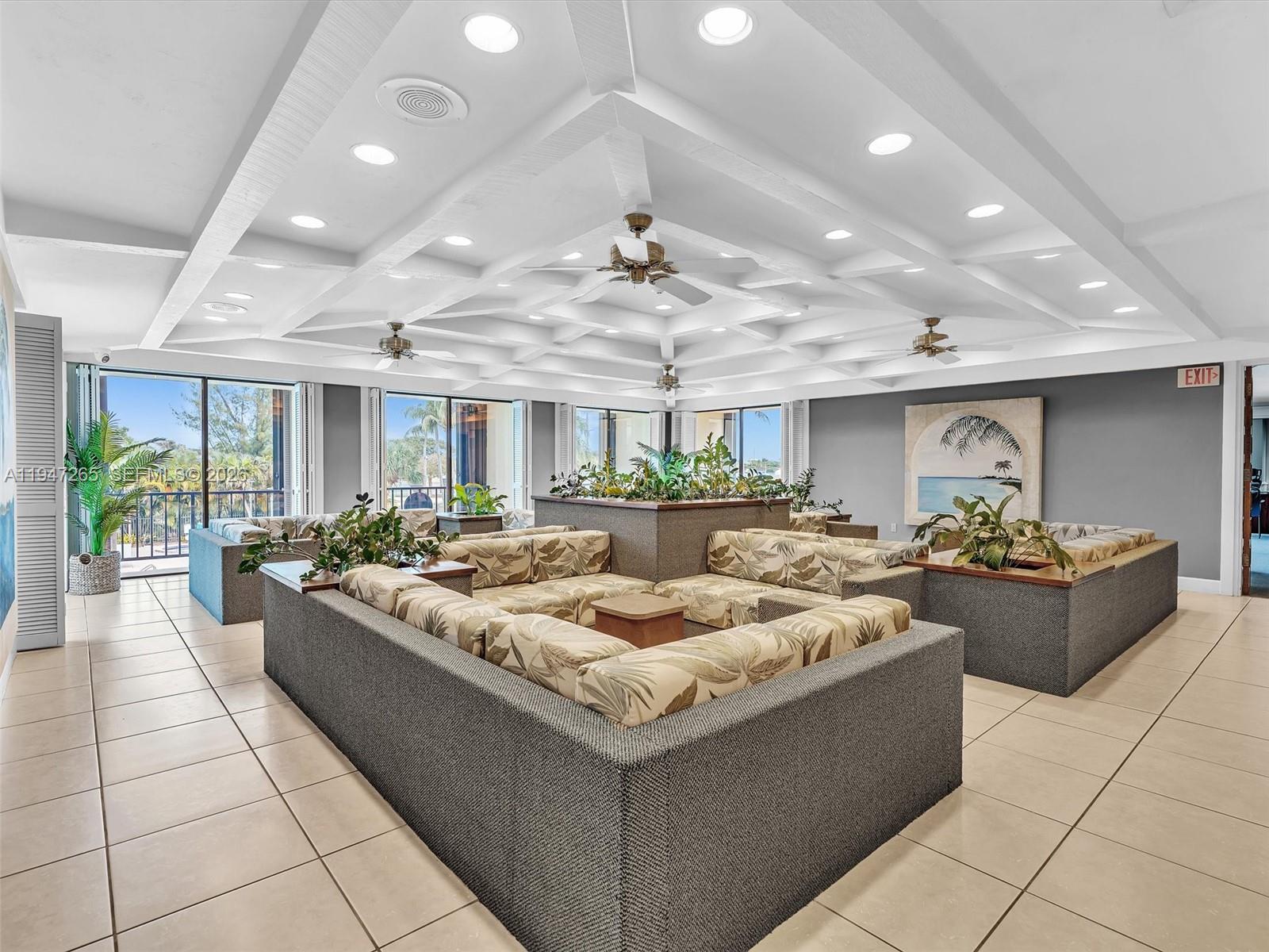 7661 Southwest 102nd Place Miami, FL 33173 - Photo 35 of 51 a living room with furniture and a large window