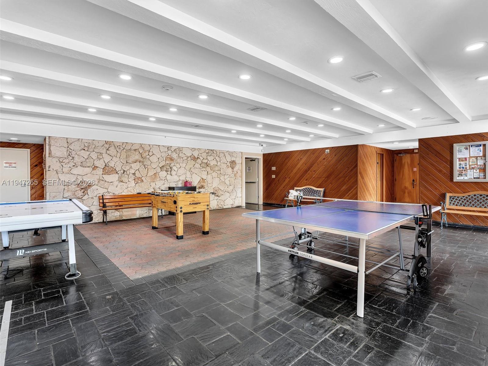 7661 Southwest 102nd Place Miami, FL 33173 - Photo 39 of 51 a room with table table tennis pool table and chairs
