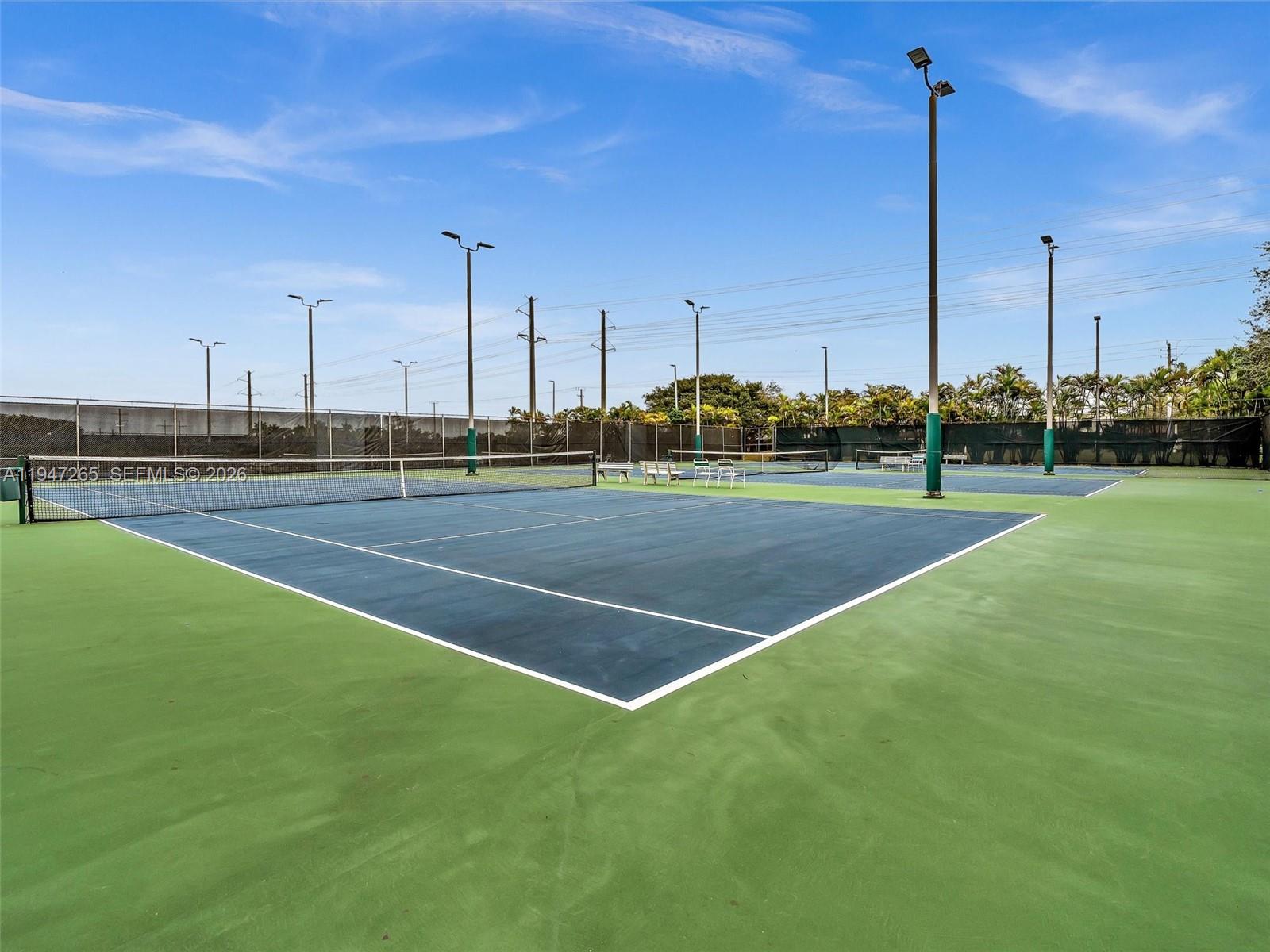 7661 Southwest 102nd Place Miami, FL 33173 - Photo 44 of 51 a view of a tennis court