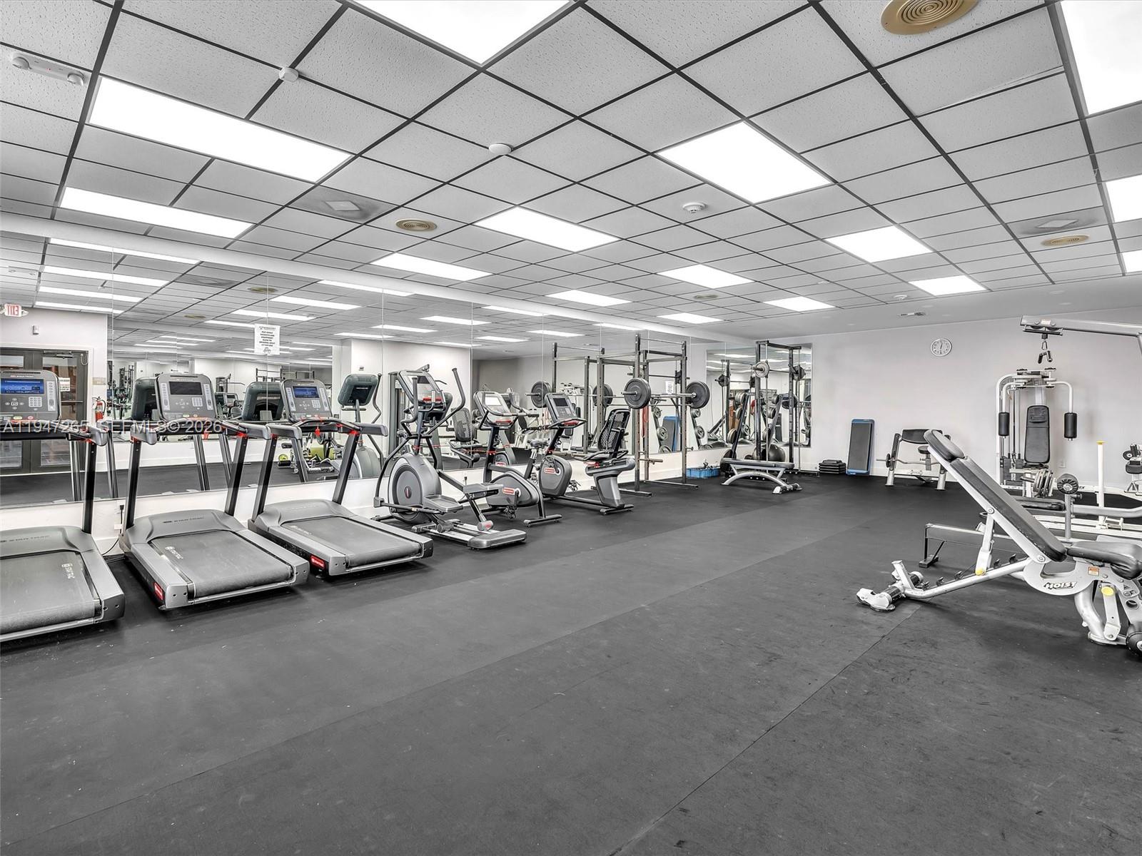 7661 Southwest 102nd Place Miami, FL 33173 - Photo 47 of 51 a view of a room with gym equipment