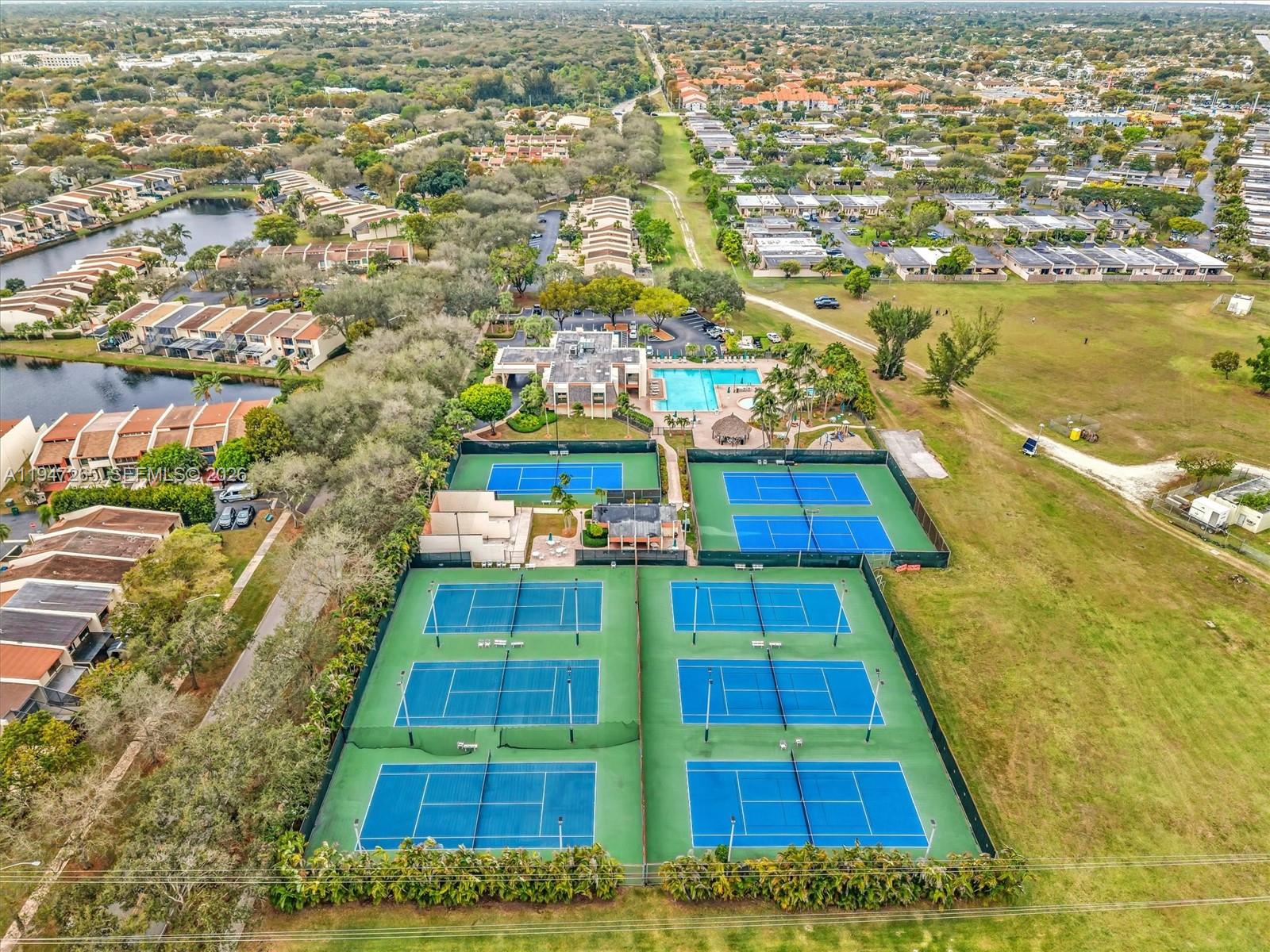 7661 Southwest 102nd Place Miami, FL 33173 - Photo 49 of 51 a view of aerial view of residential houses with yard