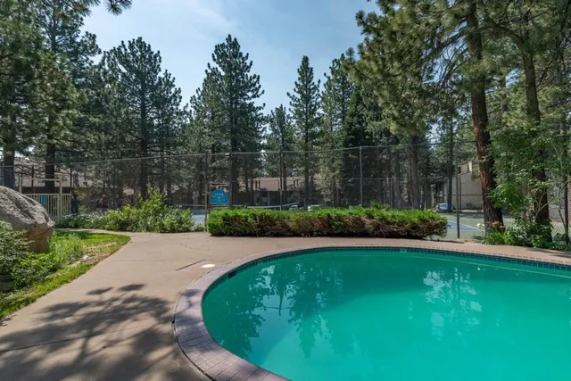 a view of a backyard with green space