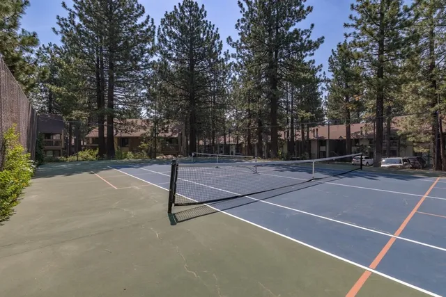 a view of a street with trees