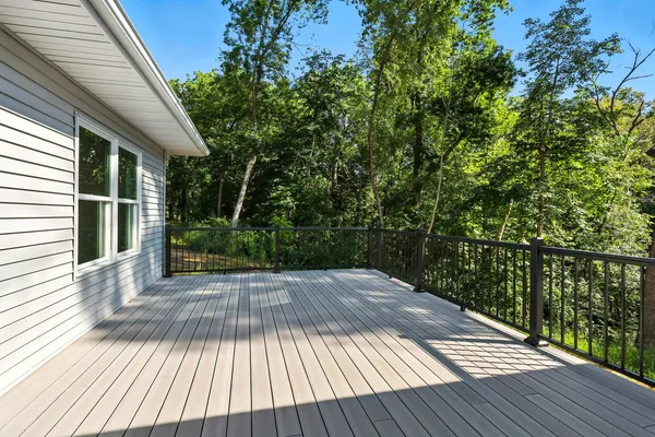 a view of outdoor space with wooden floor and yard