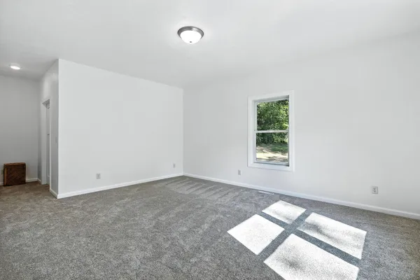 an empty room with windows