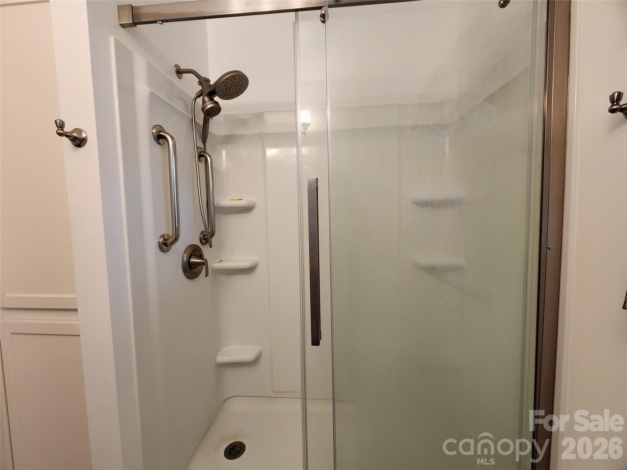 217 St John Street Dallas, NC 28034 - Photo 15 of 34 a bathroom with a shower