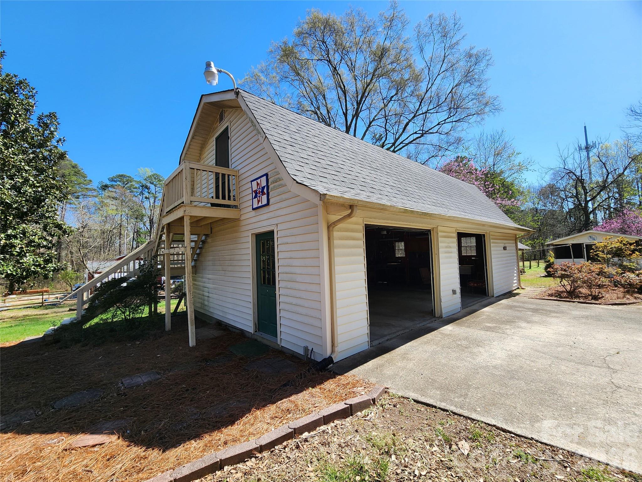217 St John Street Dallas, NC 28034 - Photo 18 of 34 a view of a house with a yard