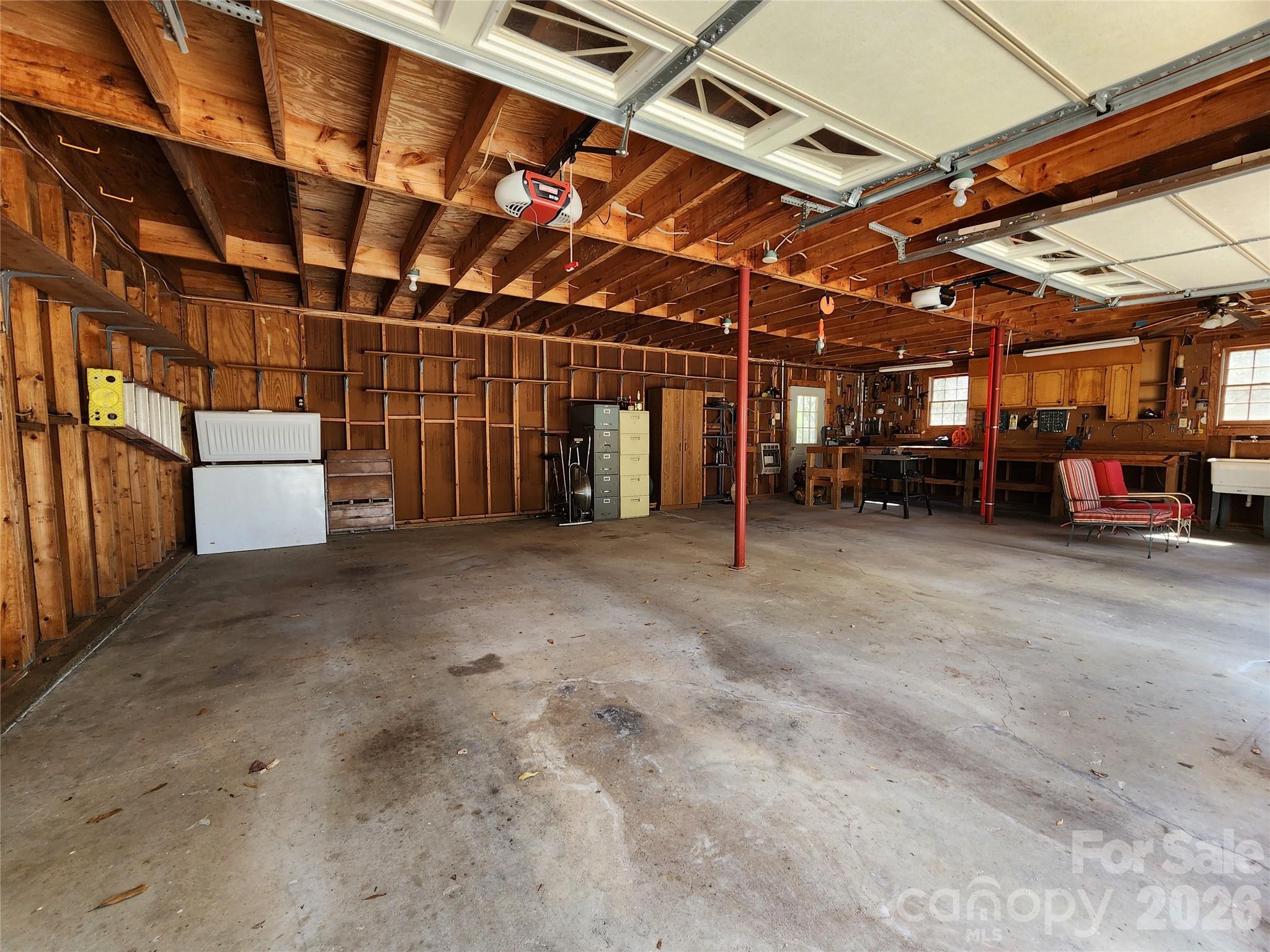217 St John Street Dallas, NC 28034 - Photo 20 of 34 a view of a room with wooden walls