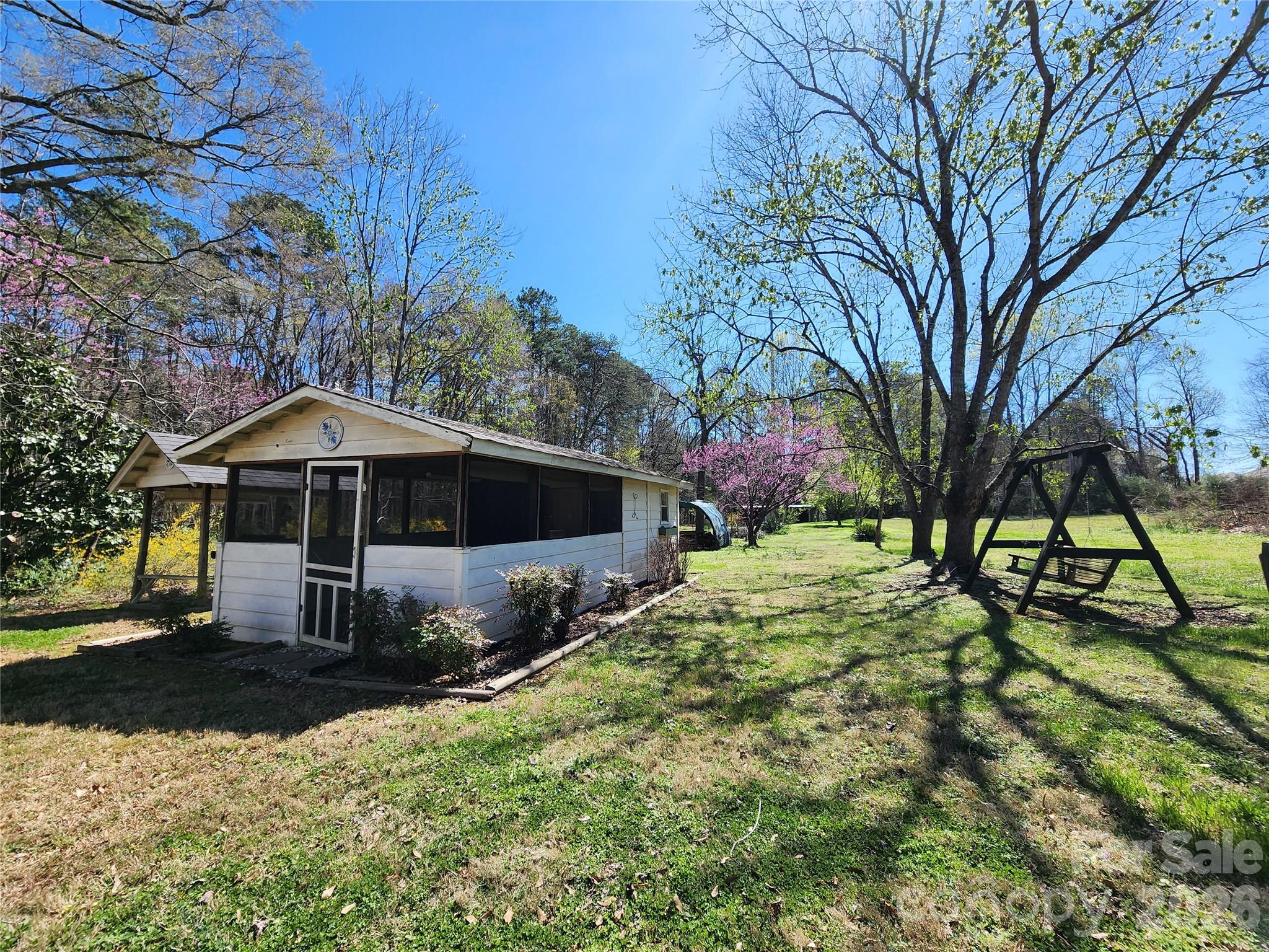 217 St John Street Dallas, NC 28034 - Photo 27 of 34 a front view of a house with a yard