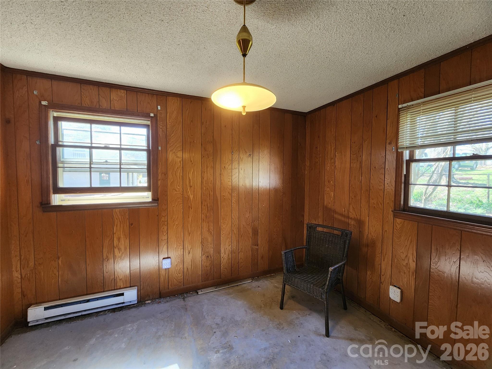 217 St John Street Dallas, NC 28034 - Photo 10 of 34 a view of an empty room with a window