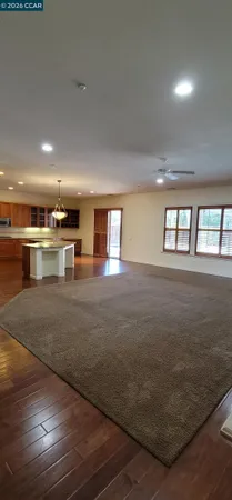 a view of kitchen with wooden floor
