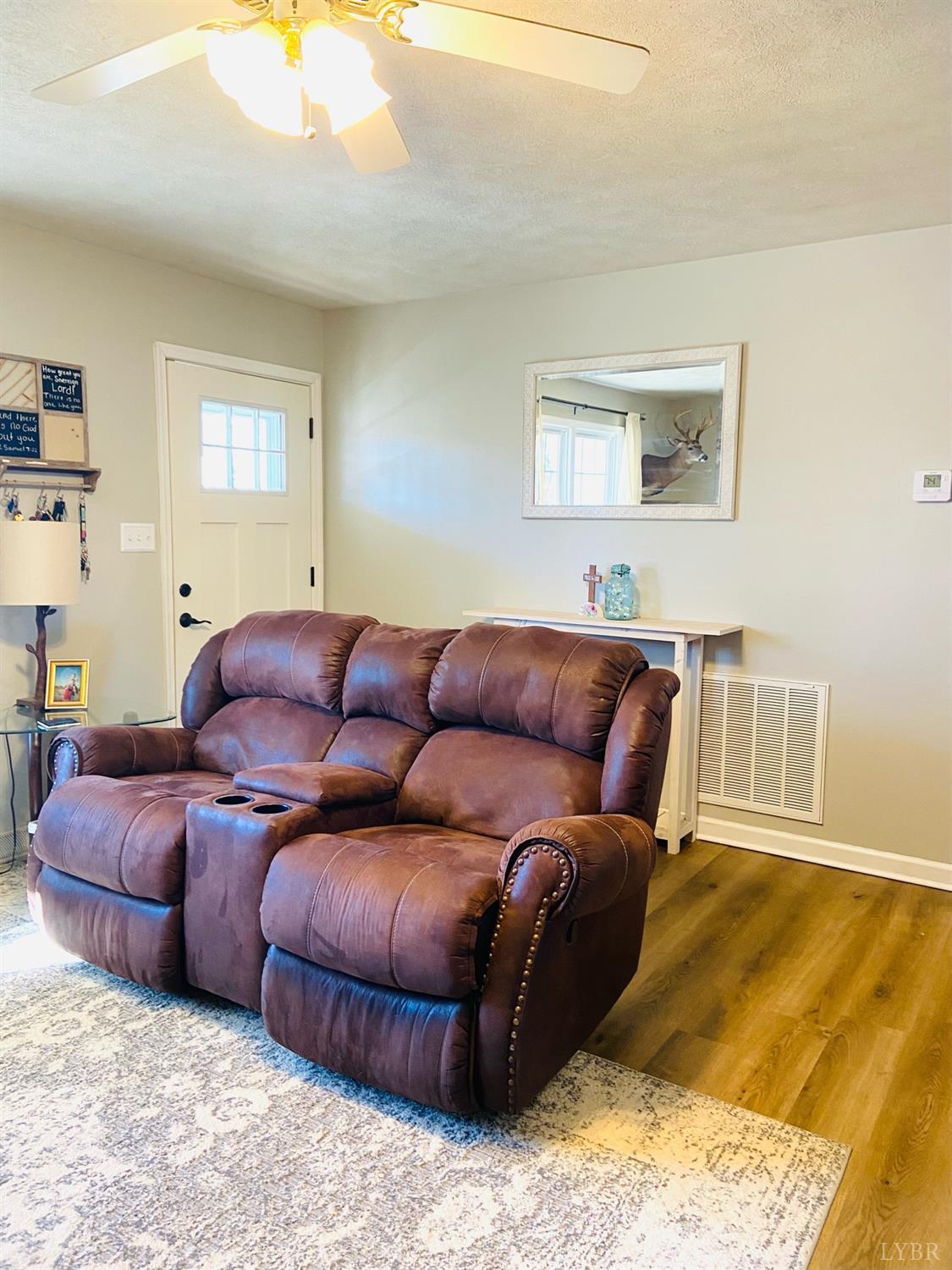 498 Stonewall Road Concord, VA 24538 - Photo 13 of 30 a living room with a couch and dresser