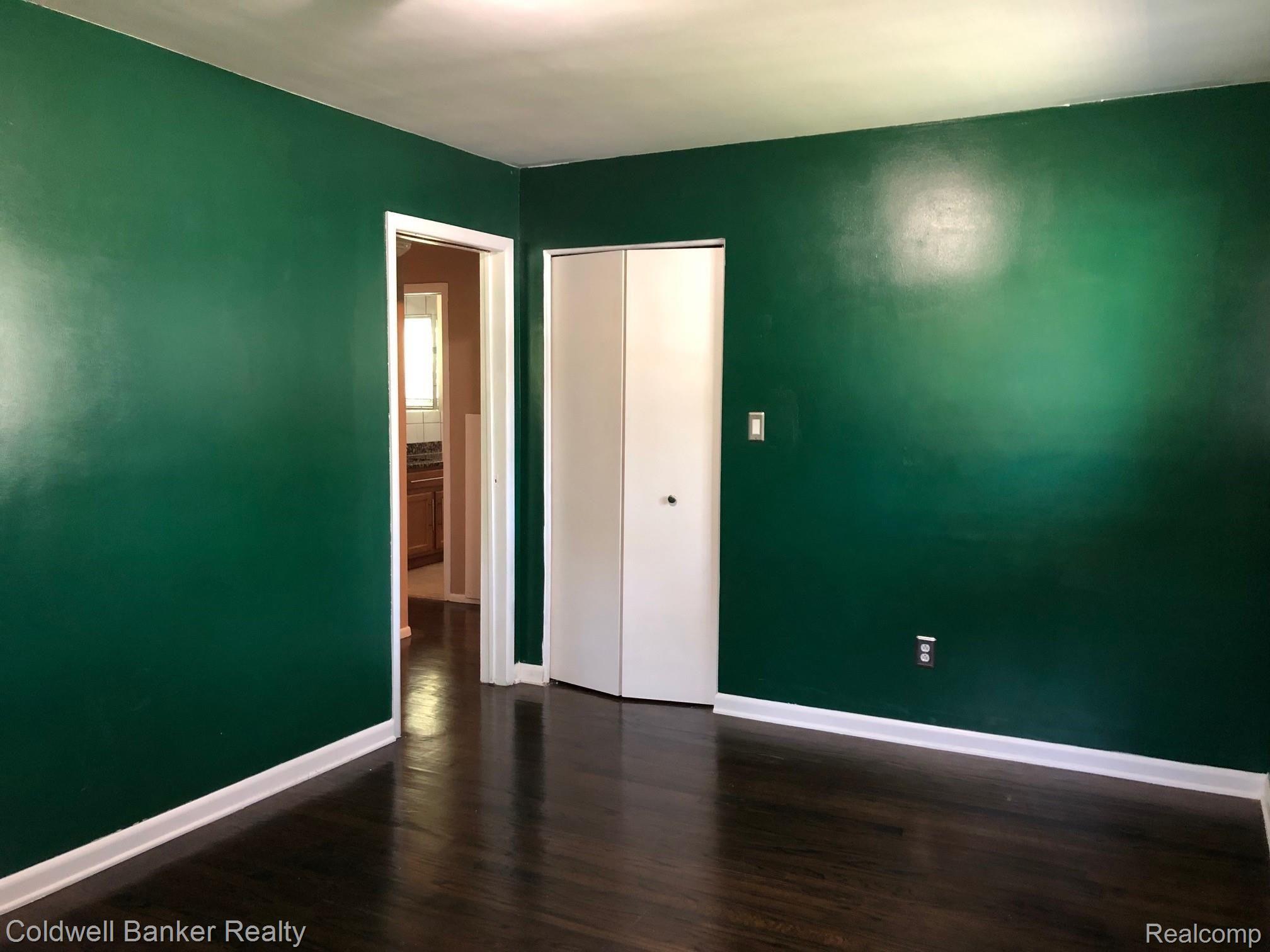 1839 Middle Trail Road Walled Lake, MI 48390 - Photo 12 of 21 Bedroom with Wood Floors