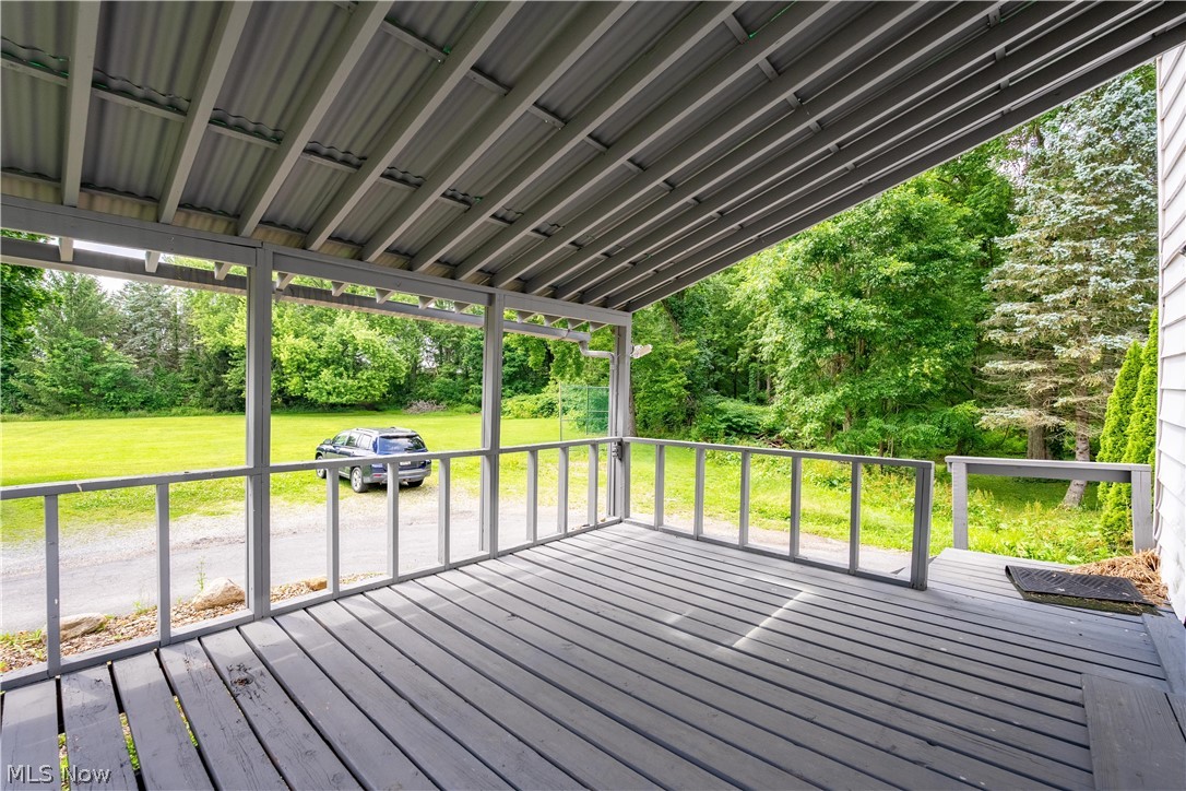8177 South Cleveland Massillon Road, Unit 55 Clinton, OH 44216 - Photo 23 of 35 Back coverd porch