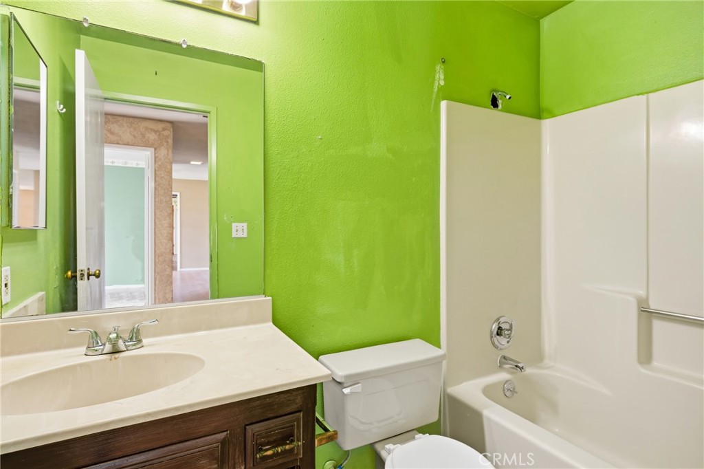 6980 Cabernet Place Paso Robles, CA 93446 - Photo 18 of 30 a bathroom with a sink and a mirror