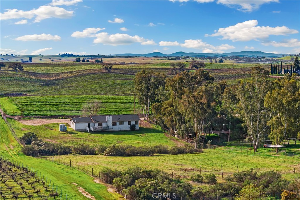 6980 Cabernet Place Paso Robles, CA 93446 - Photo 30 of 30 a view of a lake with a big yard