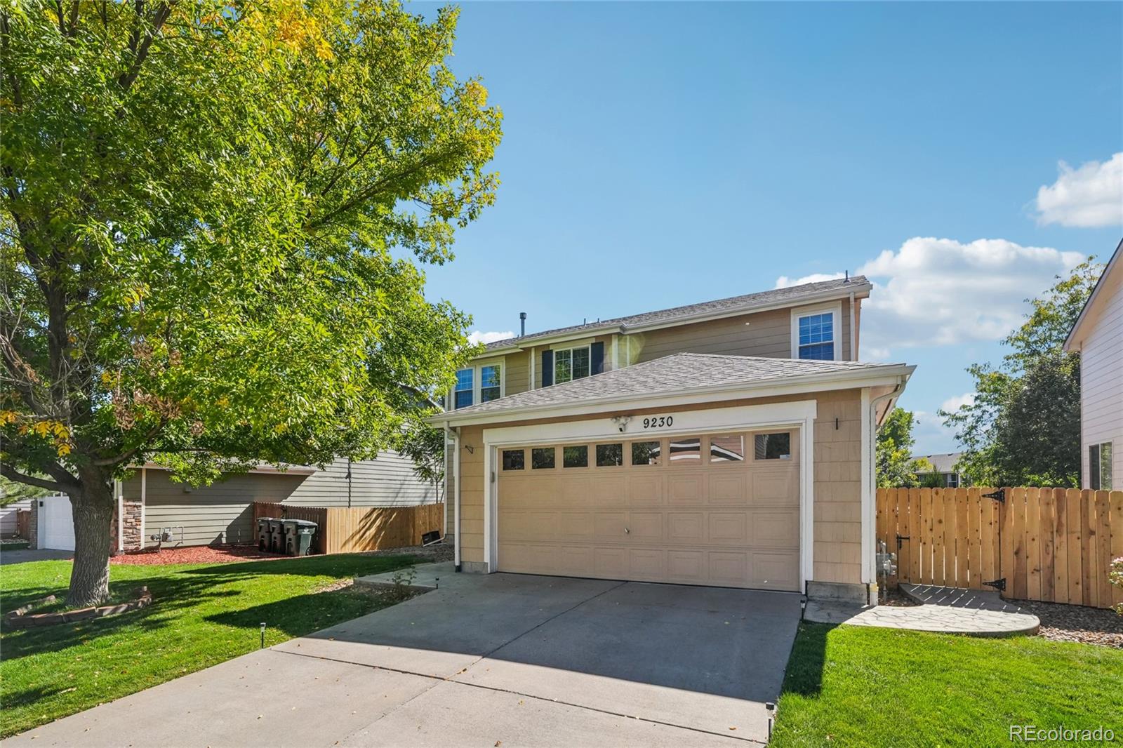 9230 Cook Street Thornton, CO 80229 - Photo 1 of 34 a view of a house with a yard