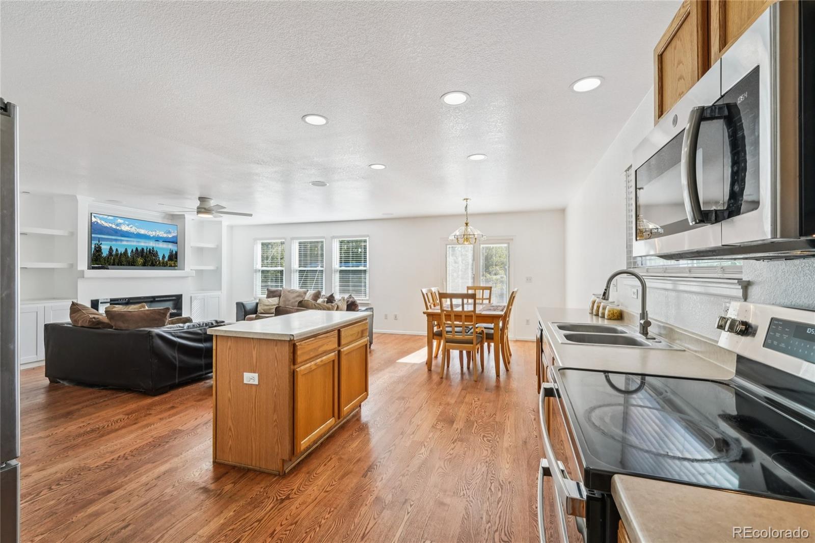 9230 Cook Street Thornton, CO 80229 - Photo 12 of 34 a view of kitchen with dining table and chairs