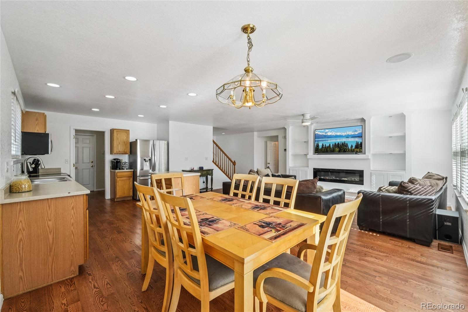 9230 Cook Street Thornton, CO 80229 - Photo 8 of 34 a view of a dining room with furniture