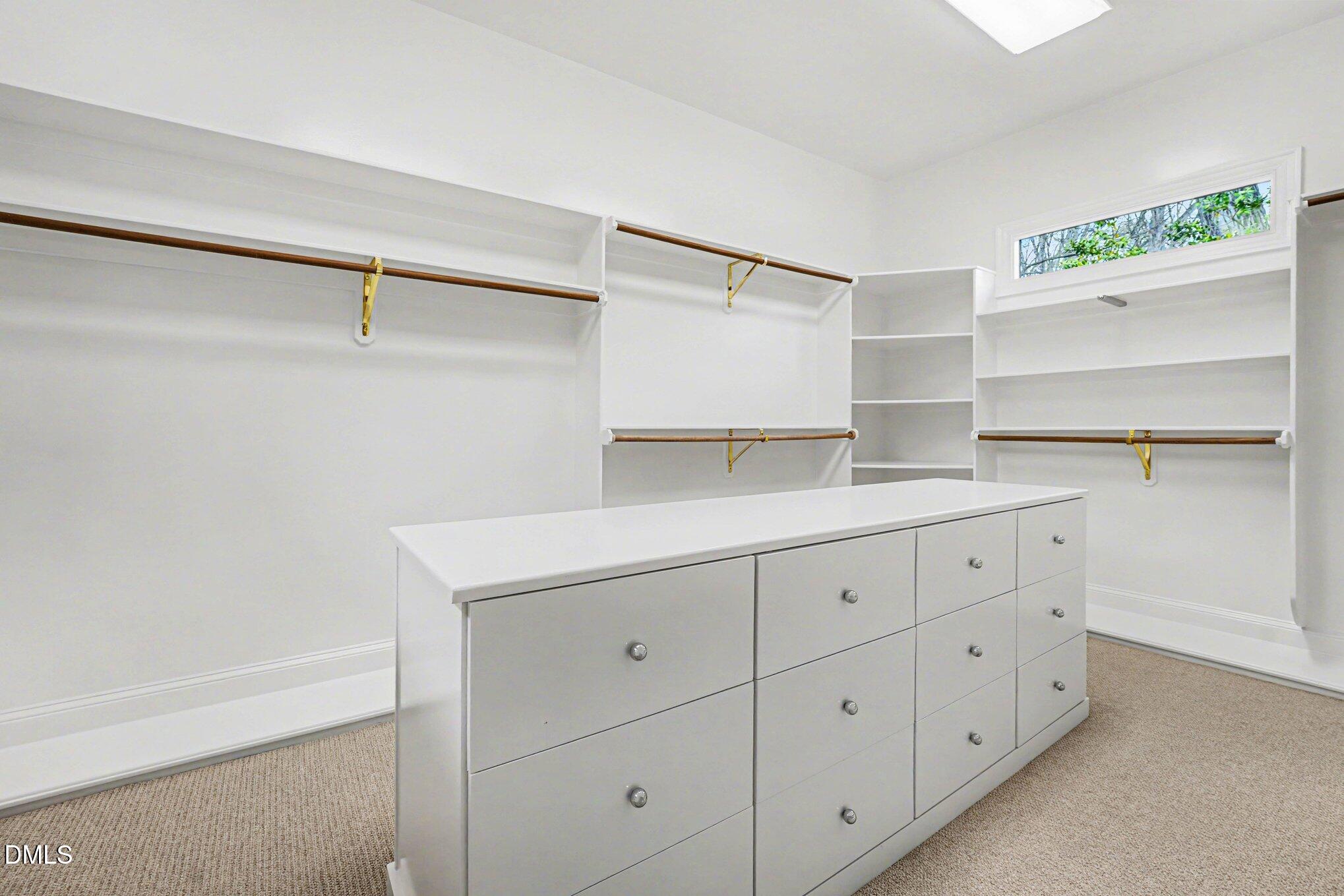 3207 Sussex Road Raleigh, NC 27607 - Photo 28 of 53 a utility room with cabinets washer and dryer