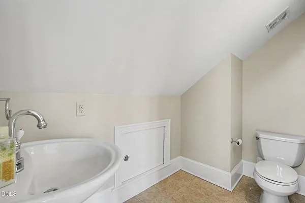 a bathroom with a sink and a toilet
