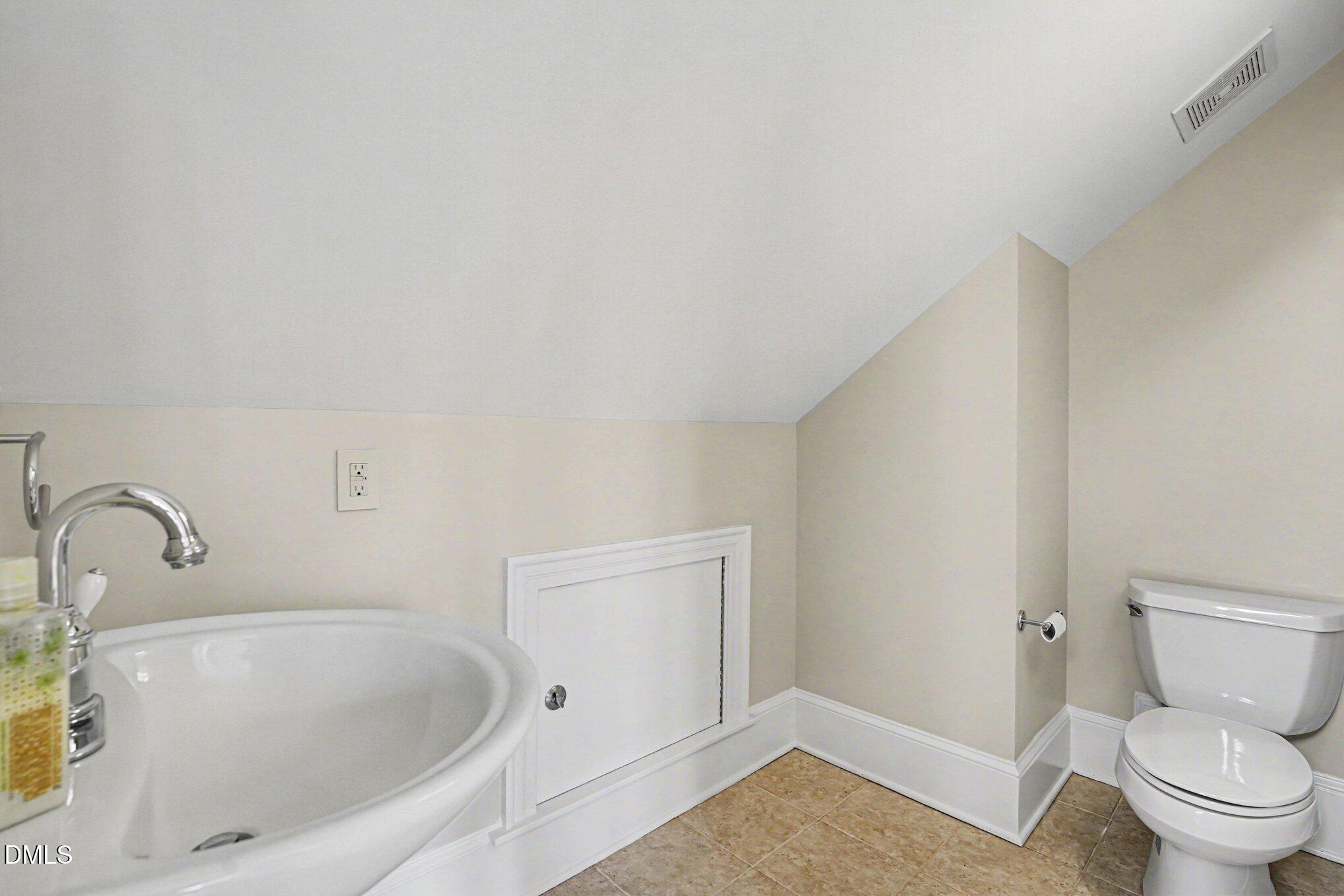 3207 Sussex Road Raleigh, NC 27607 - Photo 36 of 53 a bathroom with a sink and a toilet