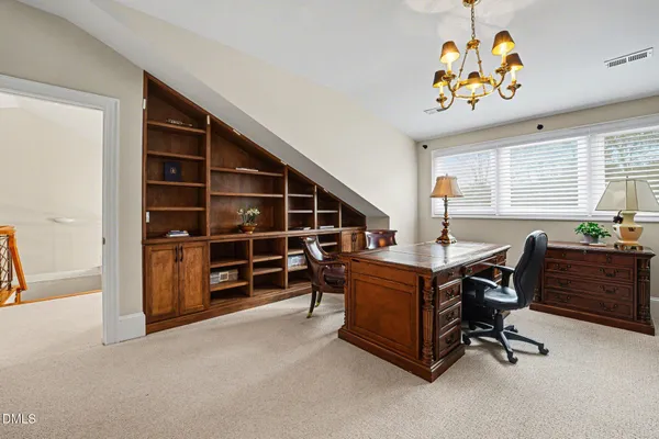 a bed room with furniture and a window