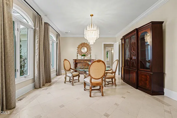 a view of a livingroom with furniture window and wooden floor