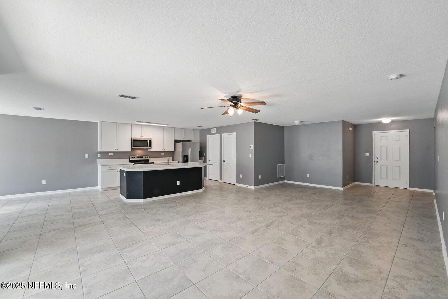 11624 Palladio Way Jacksonville, FL 32218 - Photo 4 of 15 a view of a kitchen with a sink