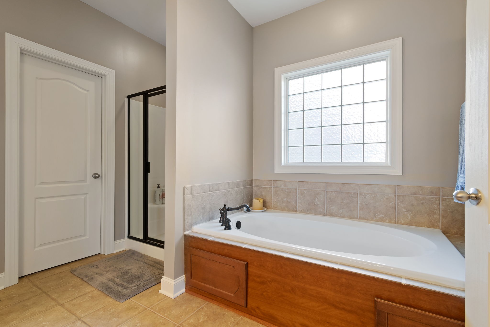 3013 Honeysuckle Drive Spring Hill, TN 37174 - Photo 33 of 55 a white bath tub sitting next to a window